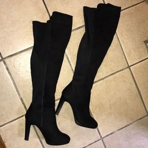 Over the knee black boots